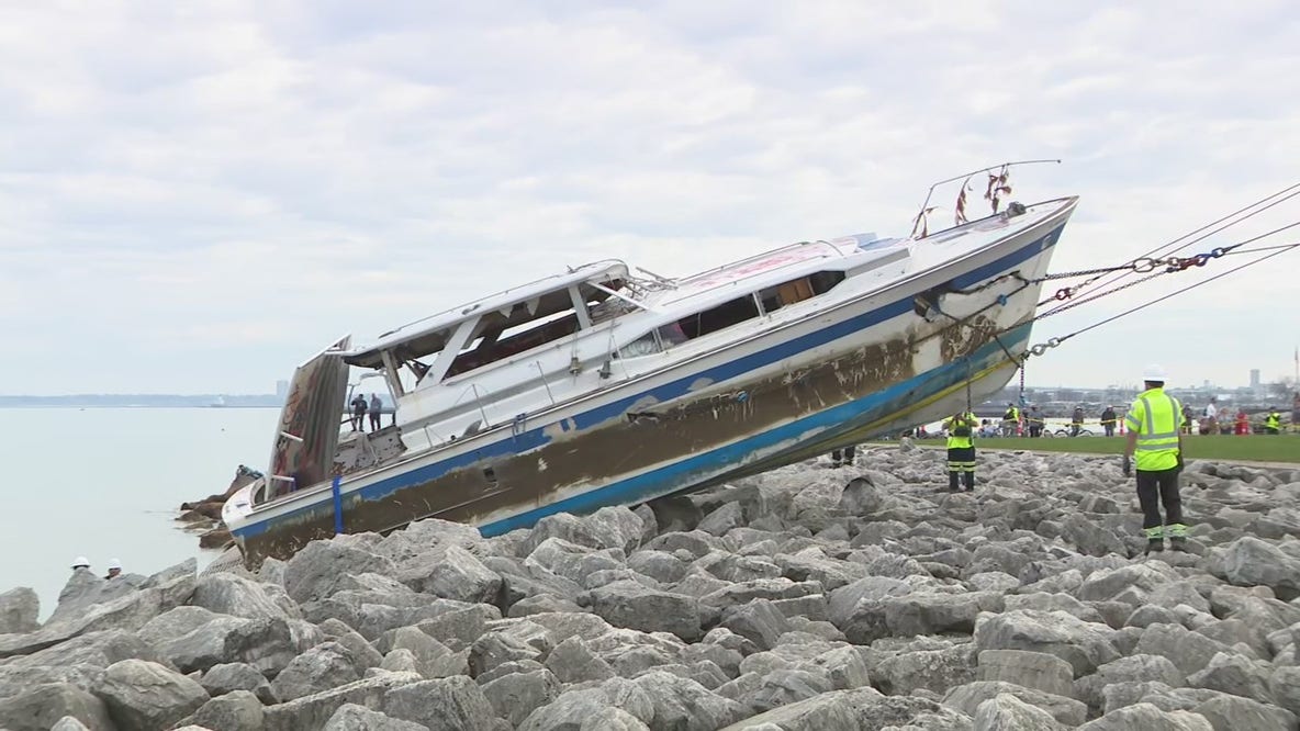 Milwaukee's abandoned boat removal; the moment it was dragged onto land